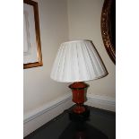 A pair of polished wood urn shape table lamp and shade