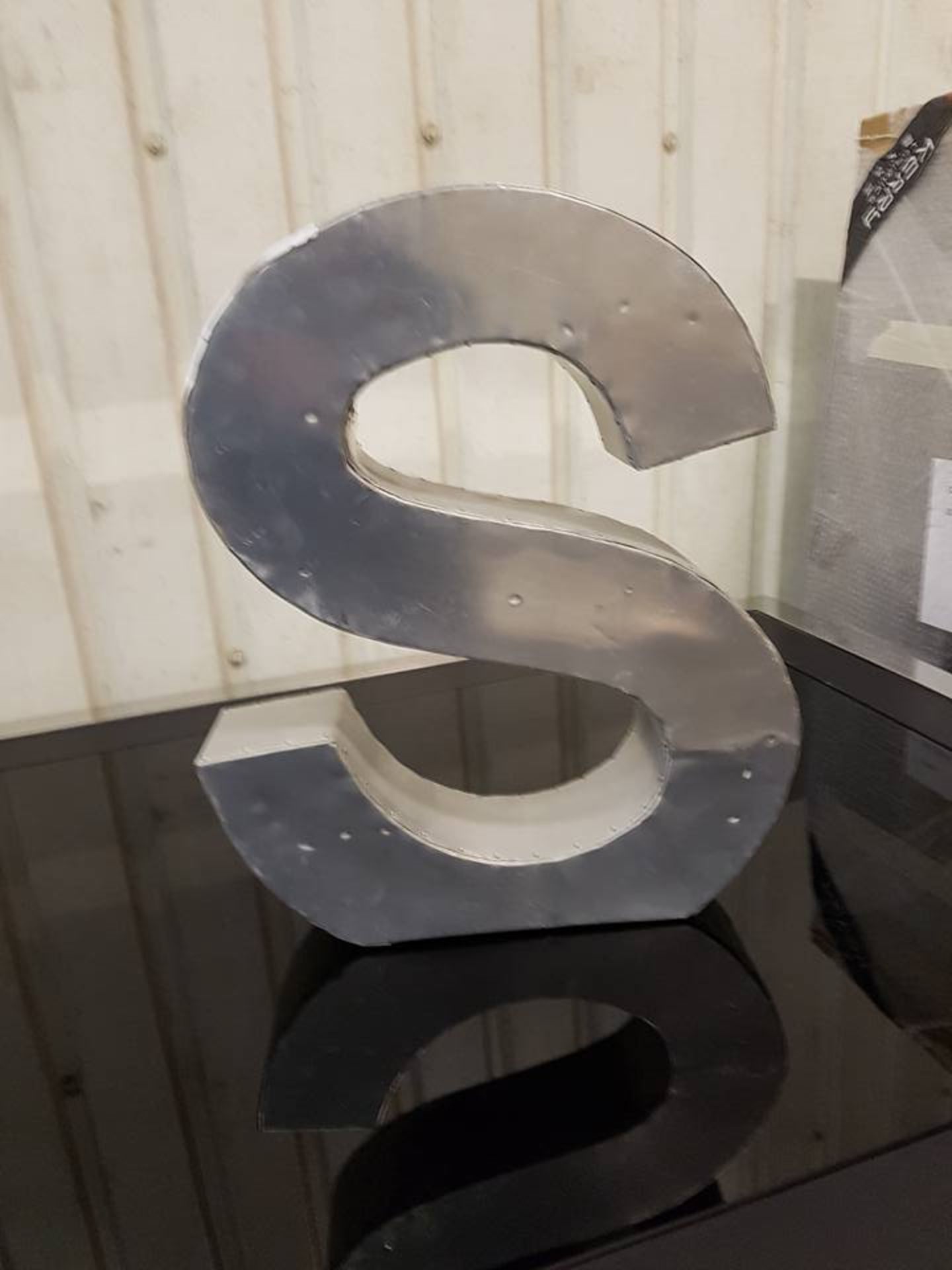 Letter S Aero handcrafted in a slightly distressed aluminium finish
