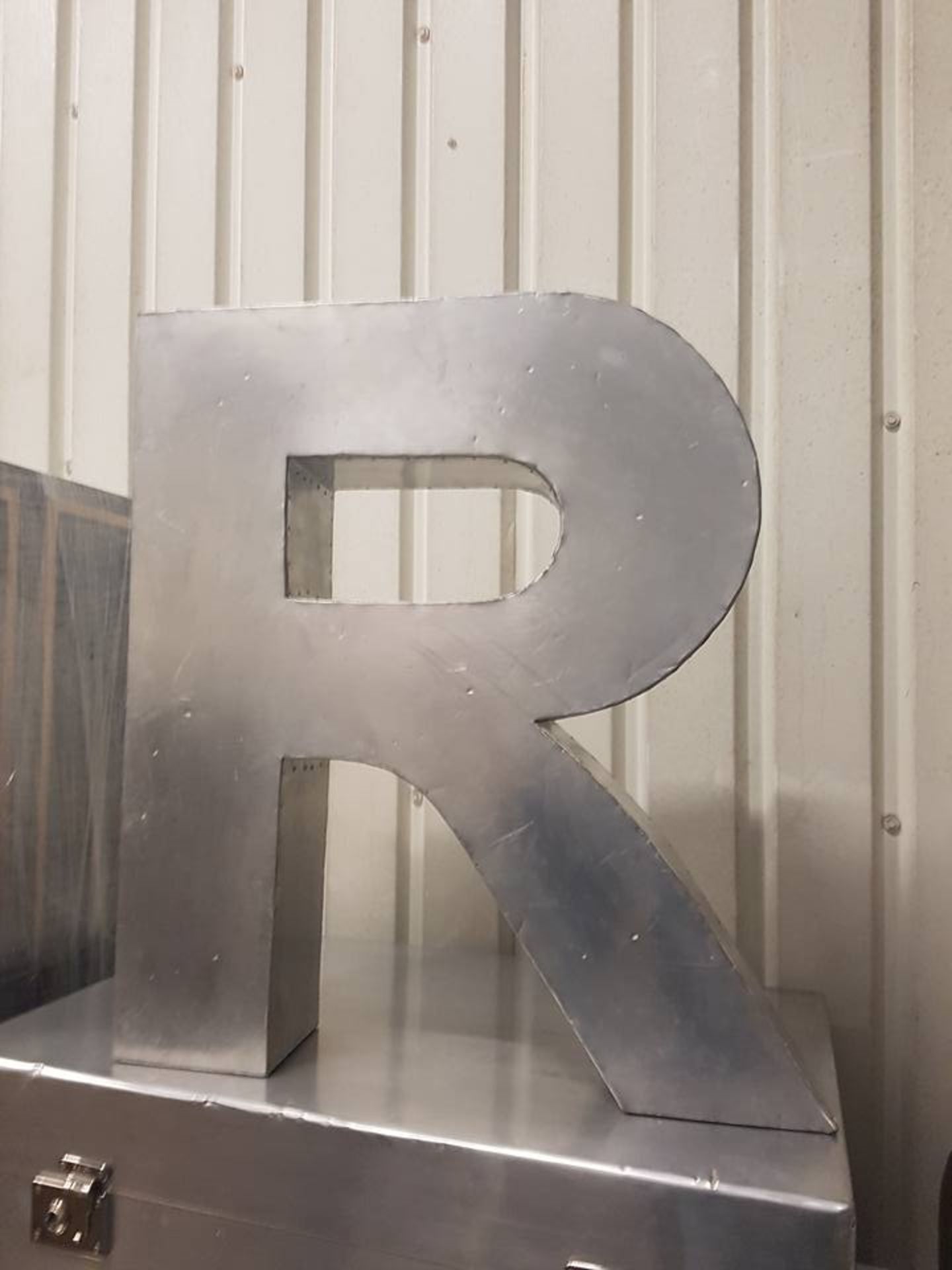 Letter R Medium Aero handcrafted in a slightly distressed aluminium finish