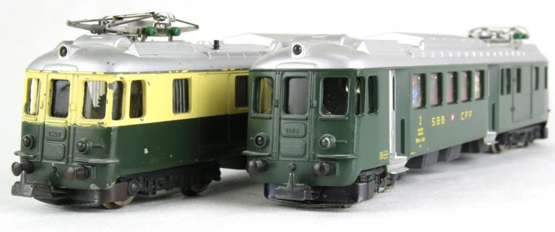 Zwei Schweizer E-Loks. Hag H0. Bodensee-Toggenburg und 1408 der SBB CFF. Bespielt, teils beschädigt,