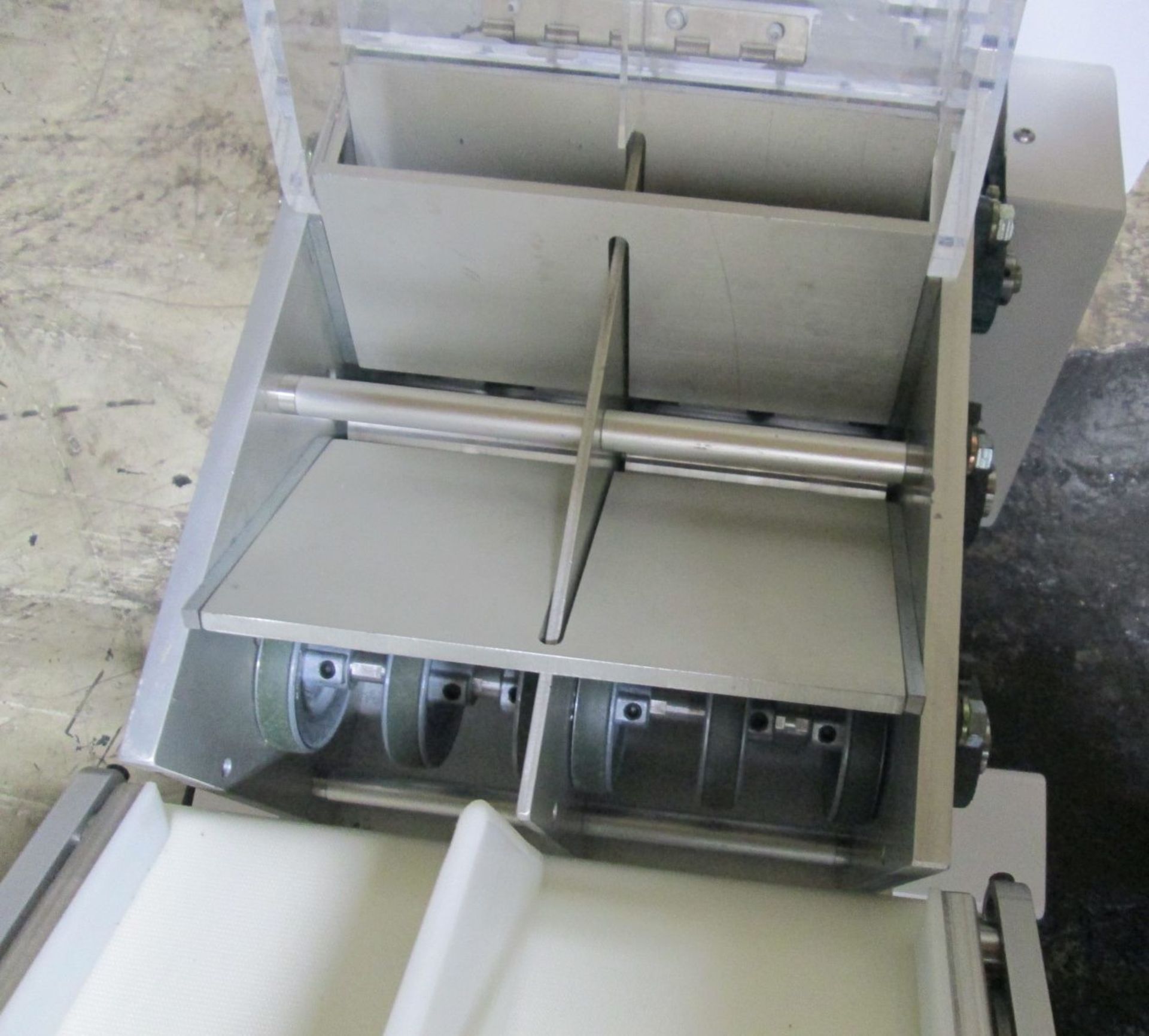 R.L. Craig Conveyor section, Decending conveyor 10" wide x 14" straight section feeds to a feeder. - Image 5 of 8