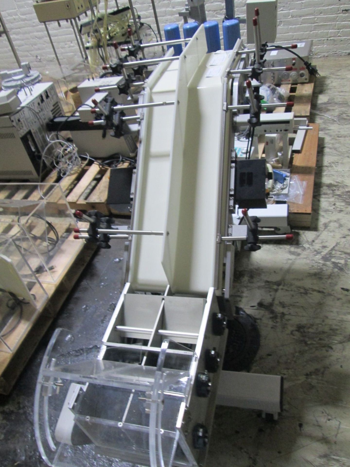 R.L. Craig Conveyor section, Decending conveyor 10" wide x 14" straight section feeds to a feeder. - Image 7 of 8