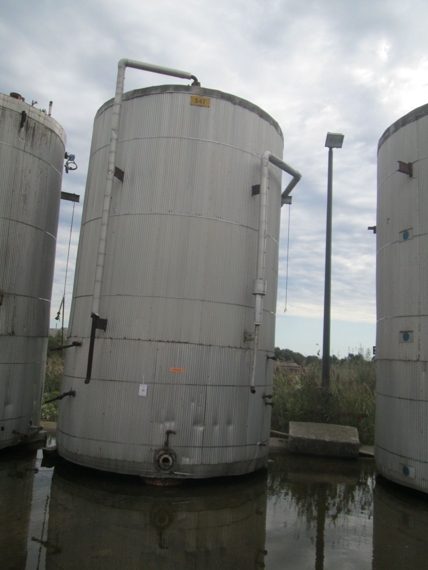 14500 O'Conner storage tank, carbon steel construction, 11'6" diameter x 18'6" straight side, dome