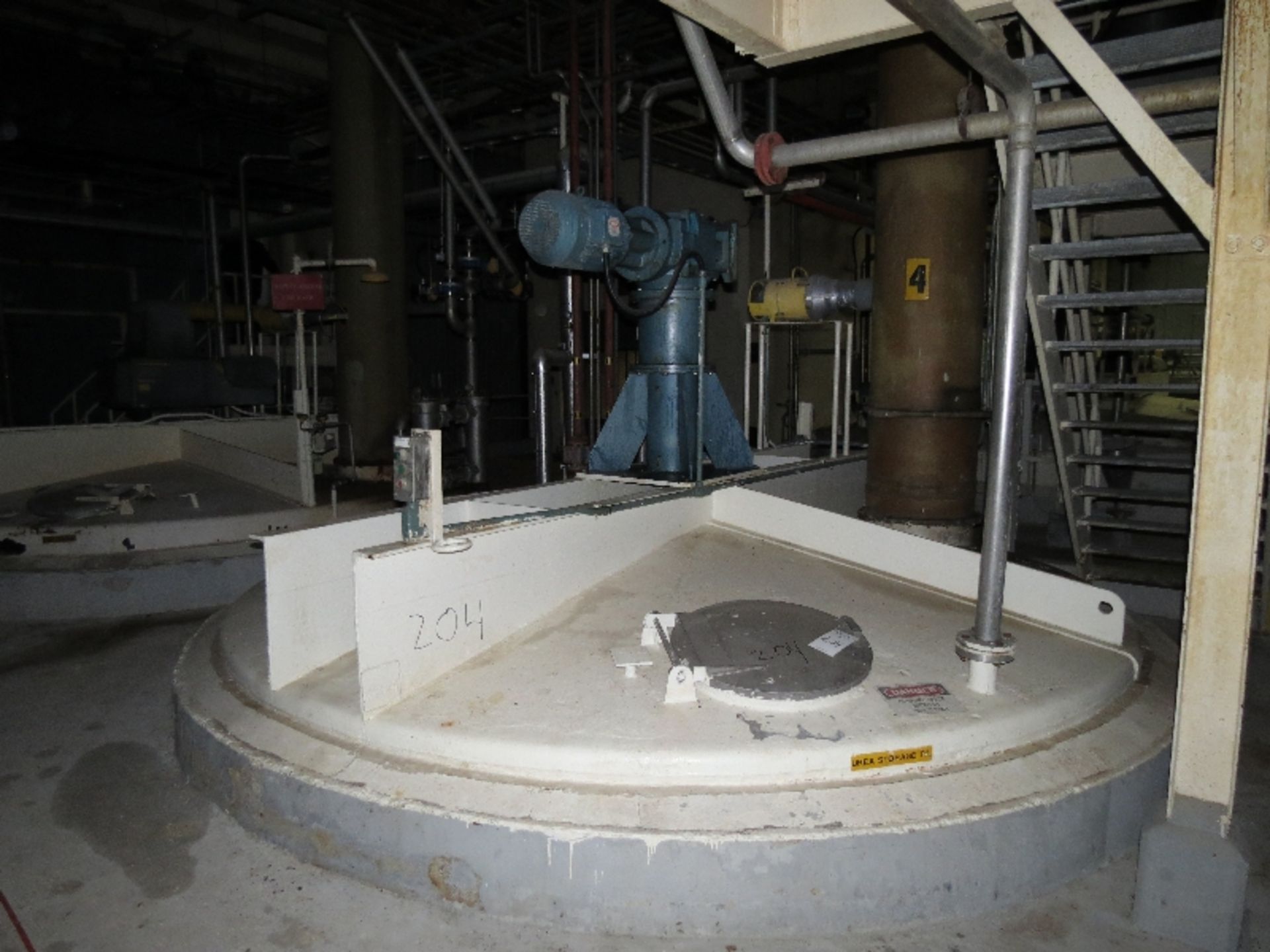 30,000 gallons carbon steel tank, 15' diameter x 23' straight side w/Agitator