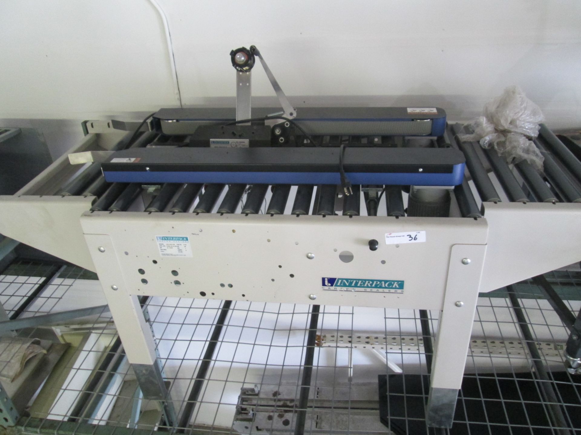 Interpack Tape machine, bottom taper, with side belts. Model USA 2024-SB, 110v, 2x1/3HP drives. As - Image 2 of 15