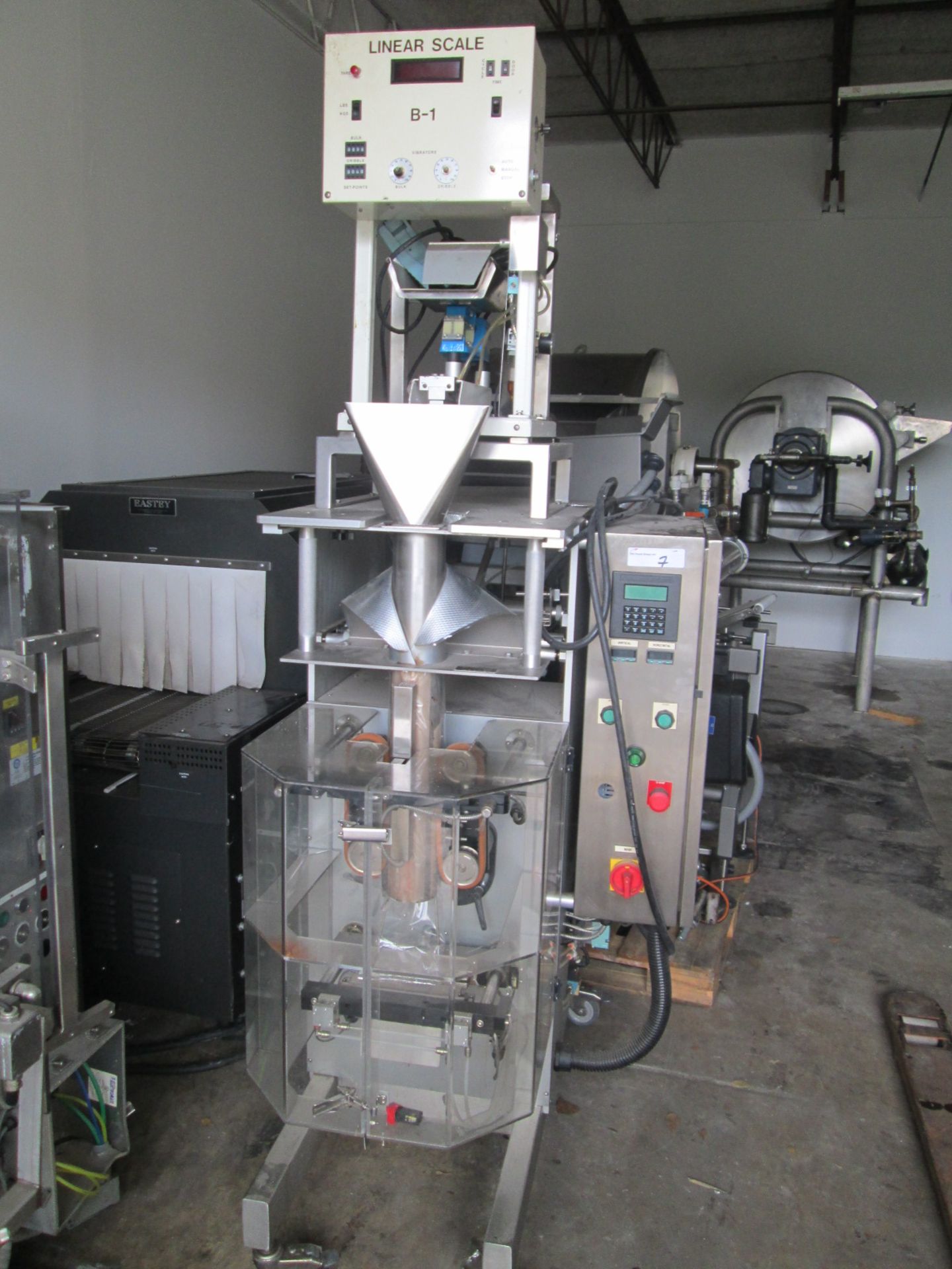 Weighpack Systems Vertical Form Fill Seal Machine with Linear Scale Feeder. Model Vertek 750