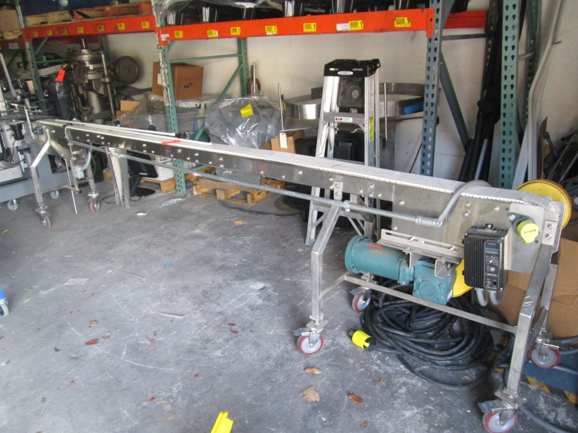Stainless Steel Conveyor Section, Mfg by Multiconveyor Inc, 5" wide long, on wheels, equipped with