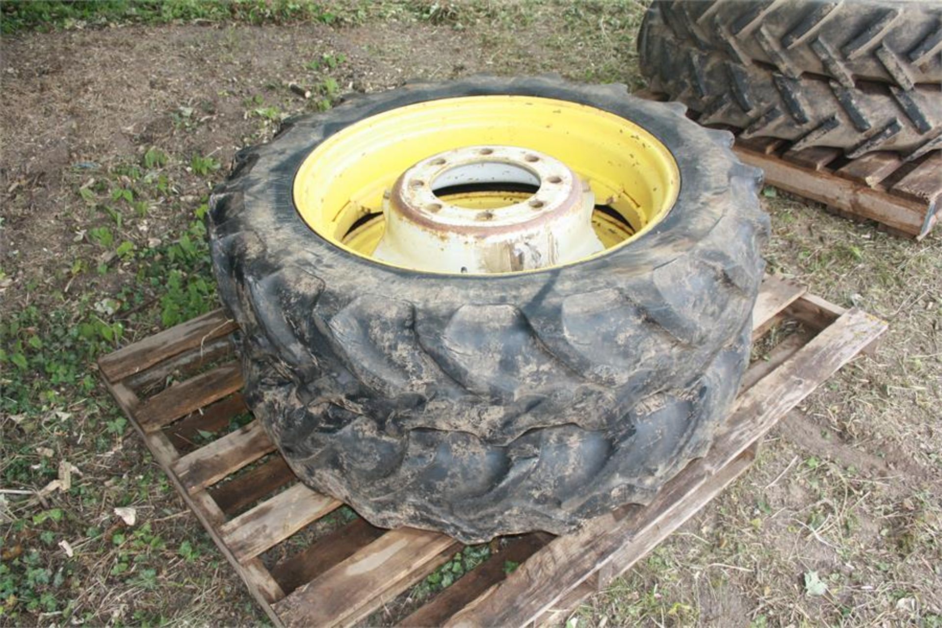 Pair of 9.5 R 28 row crop wheels