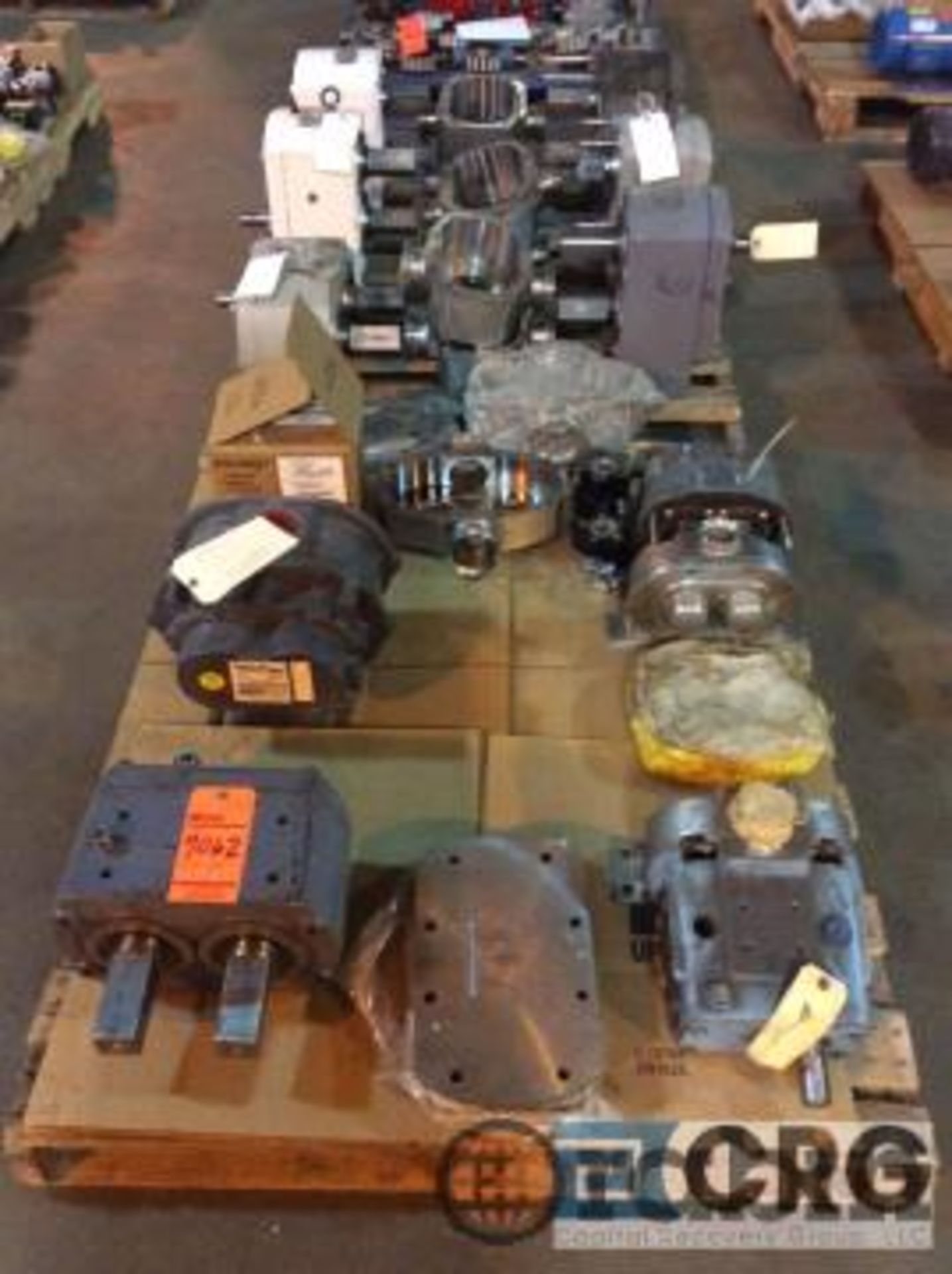 Lot of assorted positive displacement pump heads and part on (2) skids [Peoria]