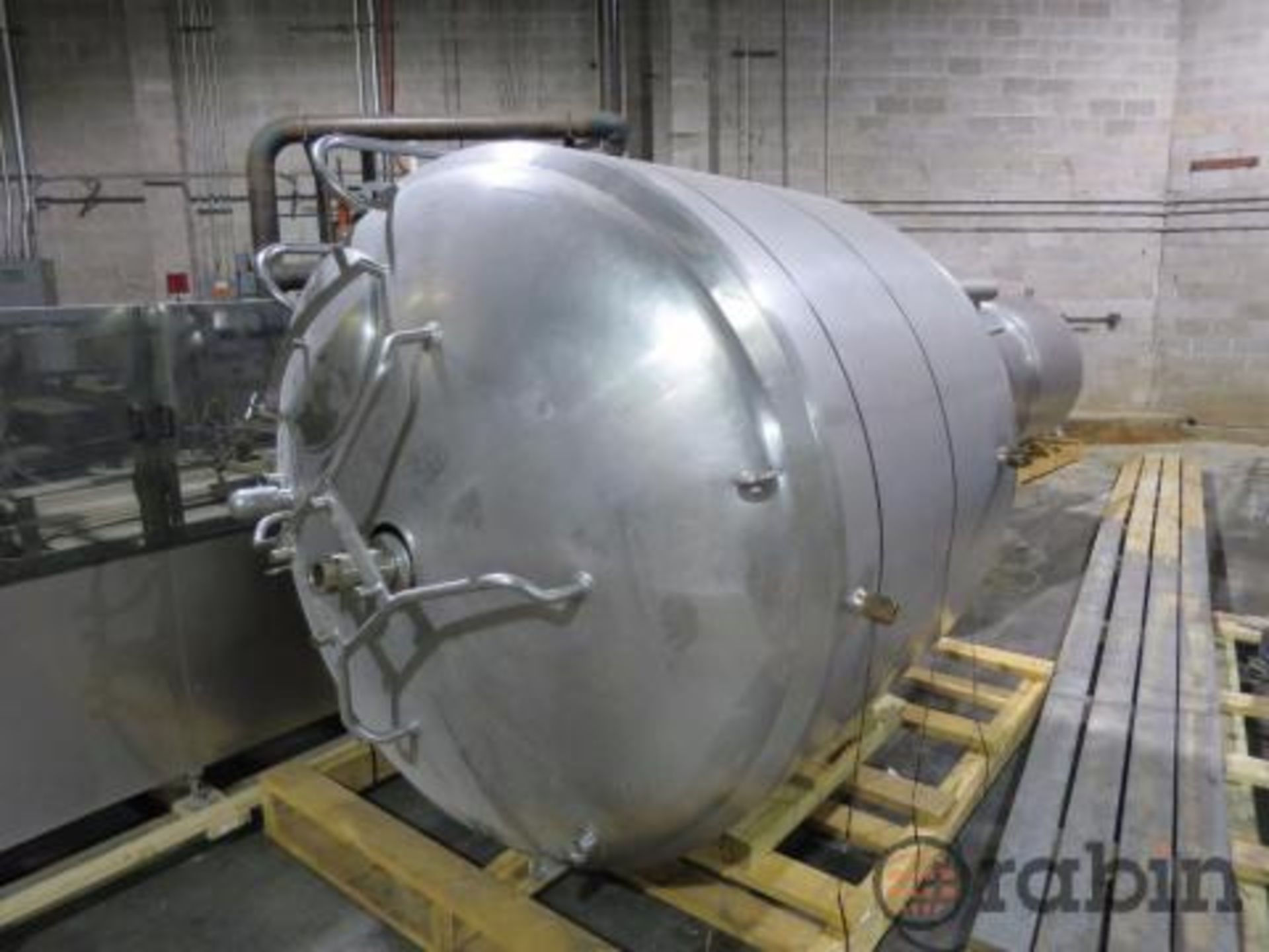 APV stainless mixing tank, 1000 gal., 6' dia x 54" st. wl., jacketed, sweep agitator, 3" CBO, 26"