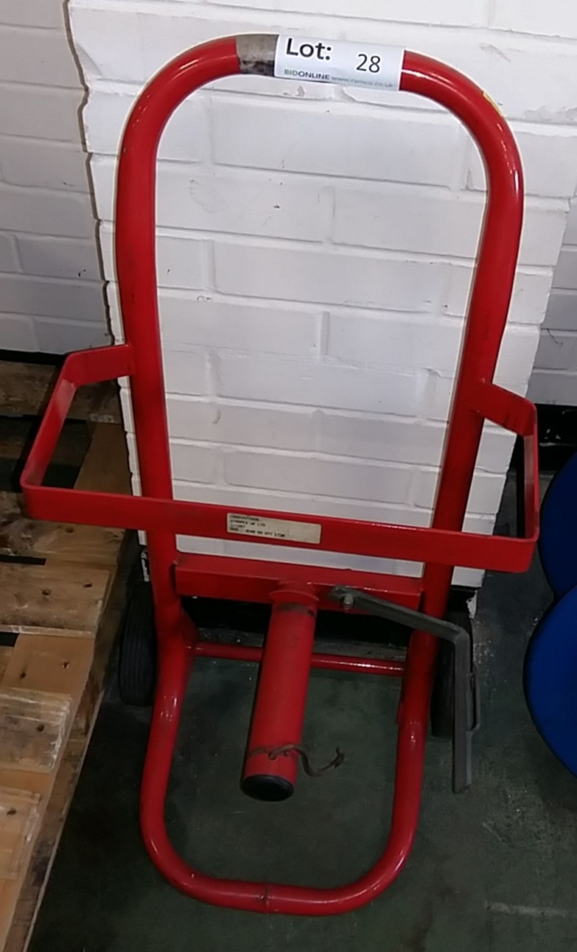 Pallet strapping trolley