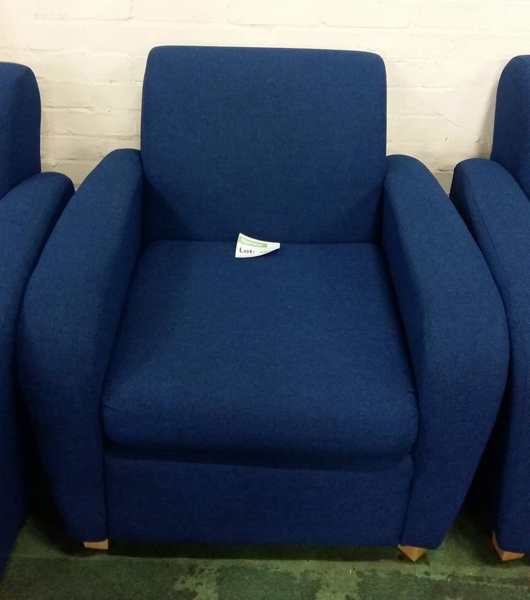 Plain blue fabric armchair