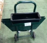 Pallet strapping trolley