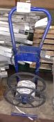 Pallet strapping trolley