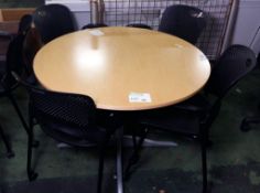 Round tables with 4 mobile Herman Millar stackable chairs