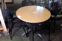 Round tables with 4 mobile Herman Millar stackable chairs