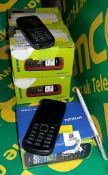 1x Nokia C1-02 mobile phone, 4x Nokia 1208 mobile phones