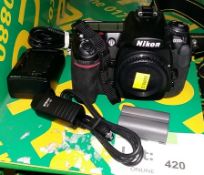 Nikon D300s camera body, MC 30 cord, battery, MH-18a quick charger