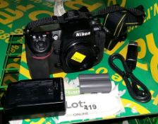 Nikon D300s camera body, MC 30 cord, battery, MH-18a quick charger