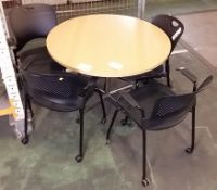 Round table, 4 Herman Miller mobile chairs