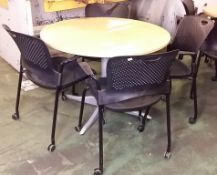 Round table, 4 Herman Miller mobile chairs