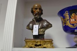 A Spanish Colonial painted wooden bust of a saint, 18th/19th century, bearded, wearing a brown