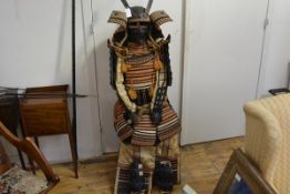 A full Japanese armour, 20th century, of Samurai type, with characteristic kabuto, black face