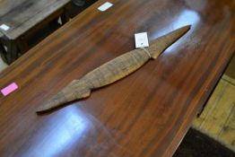 An Aborigine wood carving in the form of a fish spear, with bands of incised decoration. 52.5cm