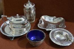 A group of silver condiments comprising a George III mustard, London 1811, with reeded handle;