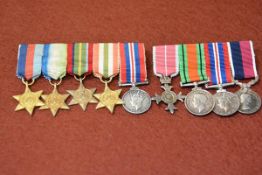 Two bars of British World War II miniature dress medals, one of five including the Pacific, Atlantic