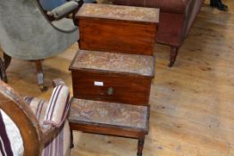 A set of mid-19th century mahogany bed steps, one carpeted step hinged for a commode.