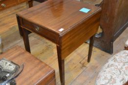 An early 19th century mahogany Pembroke table, of characteristic form, raised on tapering square