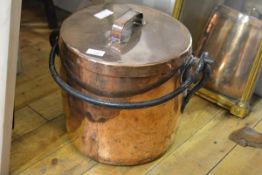 A 19th century copper log pail, of circular form, the cover with loop handle, the body fitted with a