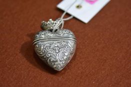 A late Victorian silver scent or vesta case, import marks for London 1894, of heart form with