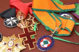 A group of modern Orders and Medals including the Order of St John, a Cross of Lorraine, Irish order