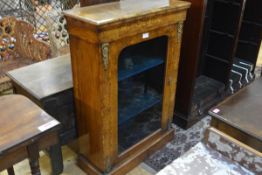 A mid-19th century marquetry-inlaid, gilt-metal mounted walnut pier cabinet, the moulded rectangular