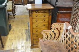 An early 19th century rosewood Wellington chest, of characteristic form, with seven graduated