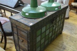 A painted and distressed metal-bound chest, the hinged cover mounted with decorative metalwork