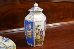 A Dresden porcelain vase and cover, in the style of Helena Wolfson, of octagonal form, decorated