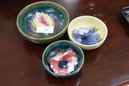 Three small Moorcroft bowls comprising: Leaf and Berry against a green ground, impressed marks; blue