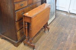 A late 19th century satin birch Sutherland table, of characteristic form, with turned legs and