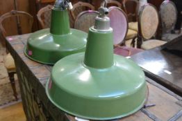 A pair of mid-century vintage green enamel pendant lamps. 40cm