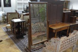 A Victorian mahogany cheval mirror, the rectangular plate within a moulded frame swivelling