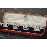 A set of four George VI silver game bird menu card holders, Hamilton & Inches, Chester 1937,