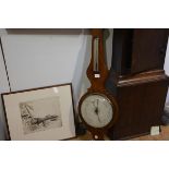 A 19th century mahogany wheel barometer, of "onion" shape, the dial unsigned. 101cm,