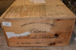 A case of twelve bottles of Chateau Les Roches Blanches 2002, St. Emilion