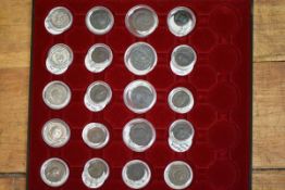 A tray of approximately thirty Roman coins, 3rd Century including Antoninianus silver coins,