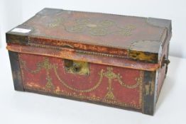 A brass-studded leather strong box in 17th century style, late 19th century, in (distressed) red