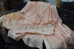 A group of 1930's/40's lingerie, part of a trousseau, comprising a variety of garments in peach