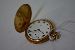 An 18ct yellow gold full hunter pocket watch, Waltham & Co., the white enamel dial with Roman